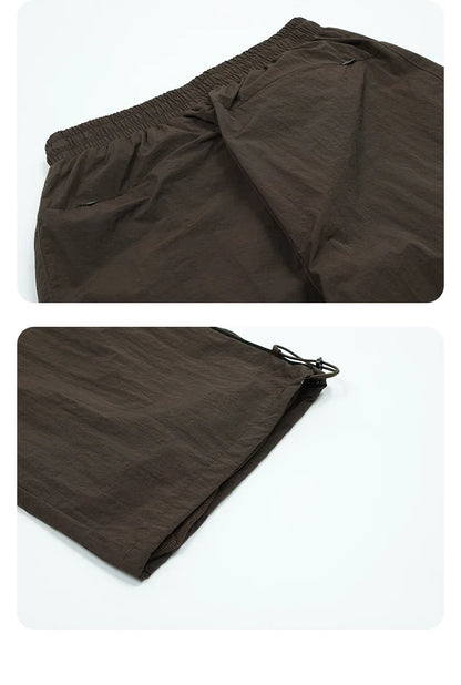 Revena™ “DriftLine” Wide-Leg Track Pants
